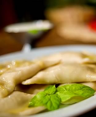 Home-made pierogi (dumplings) with cottage cheese, meat or cabbage 